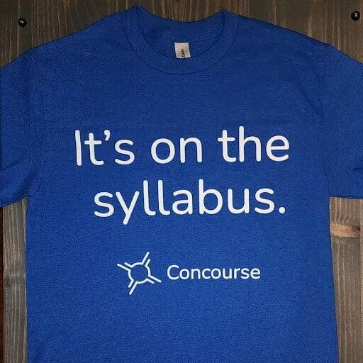 A blue t-shirt that says &quot;It's on the syllabus&quot; with the Concourse logo 