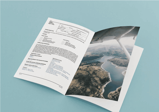 Booklet that features a syllabus and a photo taken from a plane